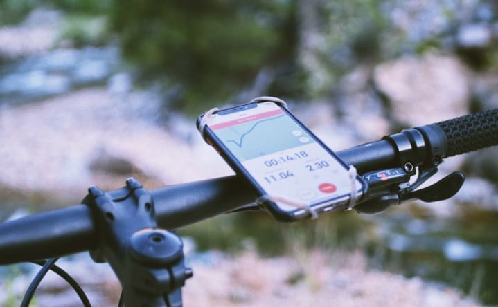 Mobiler phone mounted on bicycle handlebars